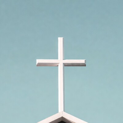 White Cross Against Blue Sky