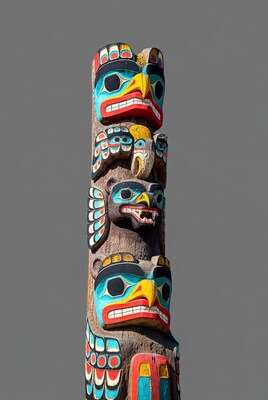 Colorful Totem Pole with Eagle Bear Faces