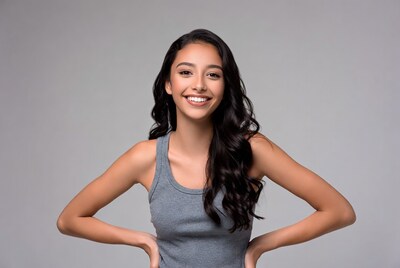 Smiling Latina woman hands on hips