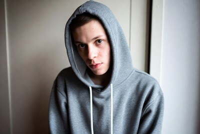 Young man in gray hoodie
