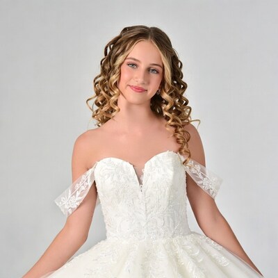 Teen girl in white off-shoulder wedding dress