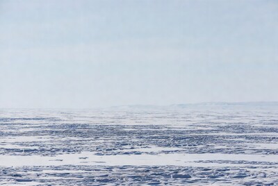 Expansive frozen sea ice landscape