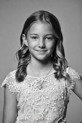 Smiling girl in lace dress portrait