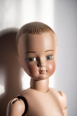 Vintage porcelain doll close-up