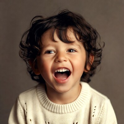 Smiling boy with curly hair