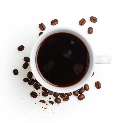 Black coffee cup with scattered beans