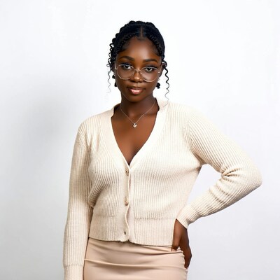 African-American woman in beige cardigan
