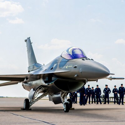 F-16 Fighter Jet with Airmen on Tarmac