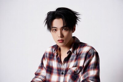 Asian man in plaid shirt
