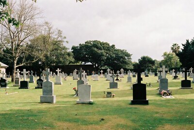 Cemetery with gravestones and crosses