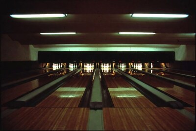 Empty Bowling Alley Lanes with Pins