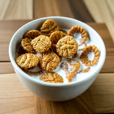 Cereal with milk in white bowl