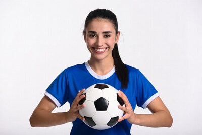 Woman holding soccer ball
