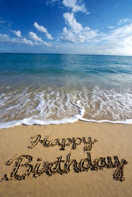 Happy Birthday in beach sand