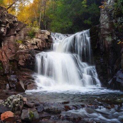 Waterfall in Autumn Forest