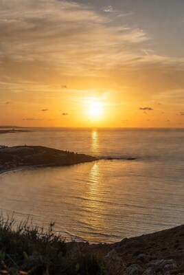 Sunset over coastal bay
