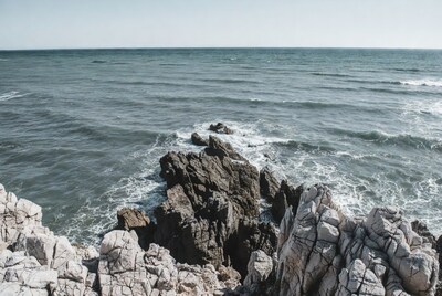 Ocean waves crashing on rocks