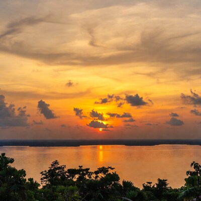 Sunset over tropical lake