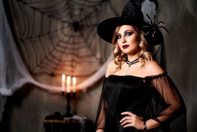 Blonde woman in witch costume
