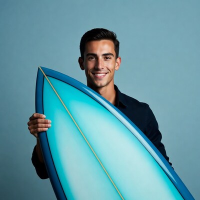 Man holding blue surfboard