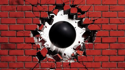 Black Cannonball Smashing Red Brick Wall