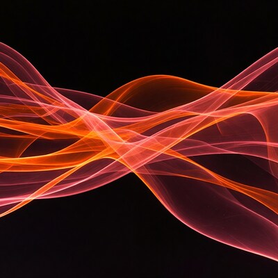 Orange wavy light trails on black