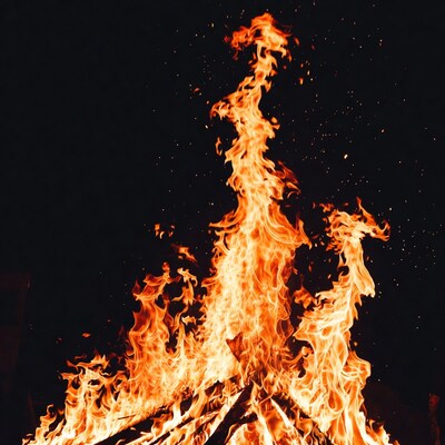 Blazing Bonfire Flames on Black Background