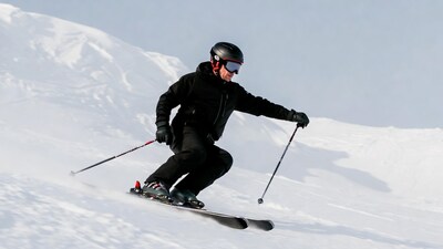 Man skiing down snowy slope