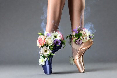 Flower-covered pointe shoes with smoke