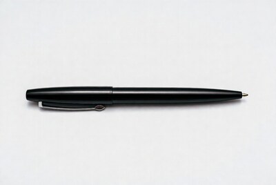 Black ballpoint pen on white background