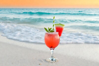 Watermelon cocktail on beach sunset