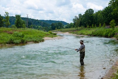 Man fishing in river
