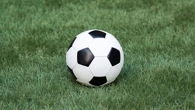 Soccer ball on green grass