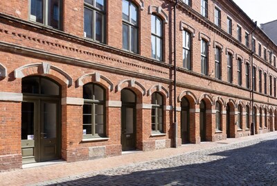 Red Brick Building on Cobblestone Street