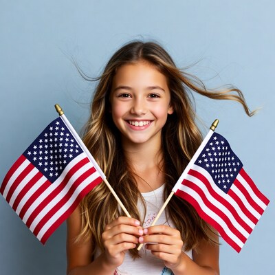 Girl holding American flags