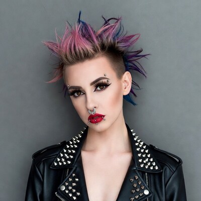 Woman with colorful mohawk and piercings