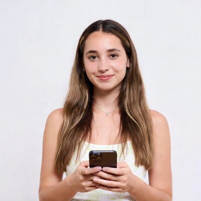 Teen girl holding smartphone