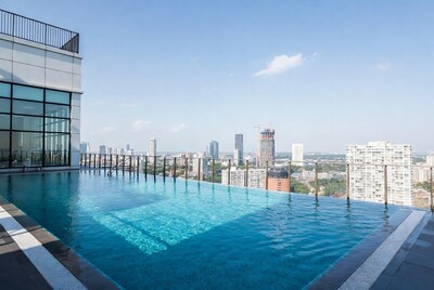 Infinity Pool Overlooking City Skyline