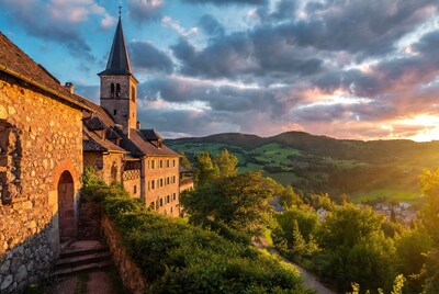 Medieval Church Tower at Sunset