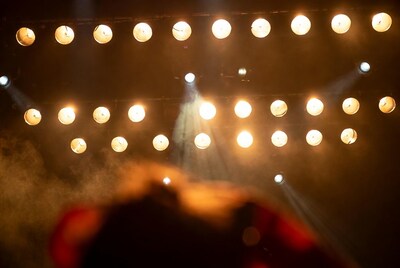 Stage lights with spotlights and fog
