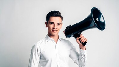 Young man holding megaphone