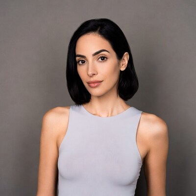 Woman with bob haircut in gray top