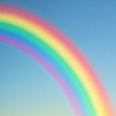 Vibrant Rainbow in Blue Sky