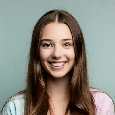 Smiling teenage girl with long brown hair