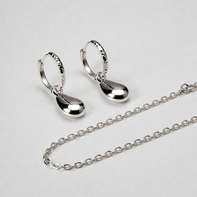 Silver teardrop earrings and chain necklace