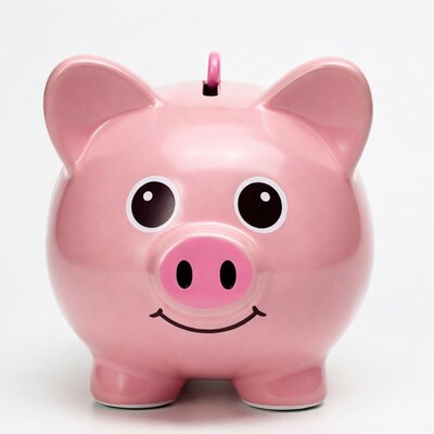 Pink piggy bank with coin slot