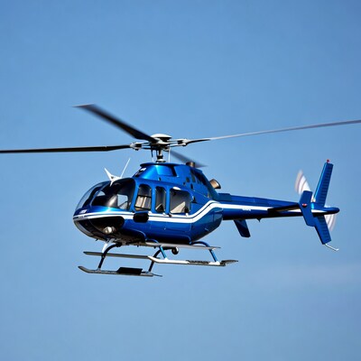 Blue helicopter flying in sky