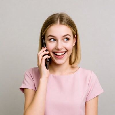 Blonde woman laughing on phone call