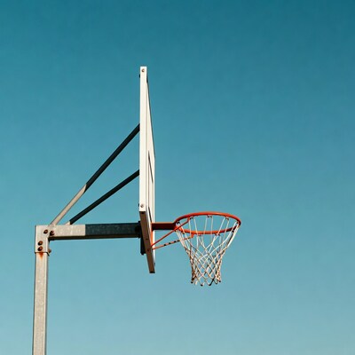 Basketball hoop on blue sky