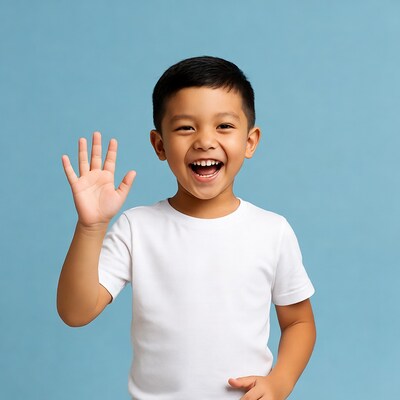 Asian boy waving hand smiling